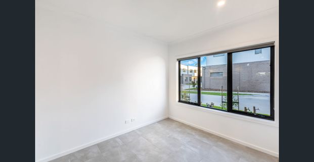 Brand New 3-Bedroom Townhouse Available Now - Photo 1