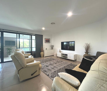 Stunning Family Home with Expansive Entertaining & Low Cost Living - Photo 2