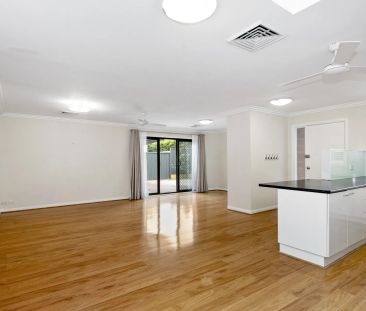 Spacious Family Townhouse with Modern Comforts and Solar Efficiency - Photo 2