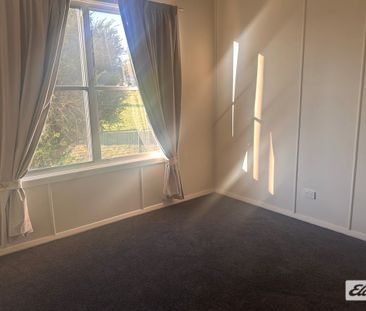 Rural outlook in the middle of town! - Photo 2