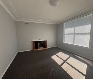 Comfortable Home with Spacious Yard - Photo 1