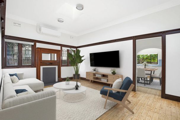 Air-Conditioned 2--3 bedroom Residence In Great Location - Photo 1