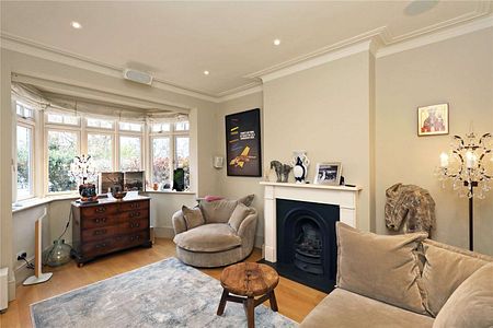 Beautiful four bedroom family home benefitting from a south facing garden and off-street parking. - Photo 2