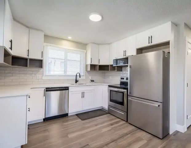 Modern Renovated Bright 3 Bedroom Unit | 12218 122 Avenue Northwest, Edmonton - Photo 1