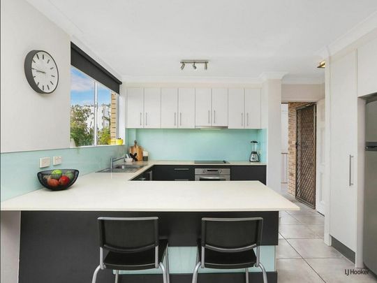 Renovated Unit with Ocean Glimpses - Photo 1