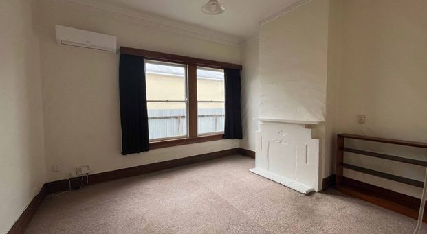 Spacious Four-Bedroom Home in a Prime Location - Photo 1