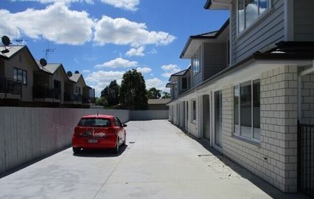 This beautifully designed three-bedroom, two-bathroom townhouse offering the perfect blend of style, comfort, and modern convenience. - Photo 5