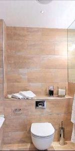 This apartment is located on the second floor of a portered building with lift service. - Photo 4