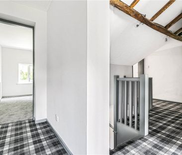 A three bedroom end terraced property situated within the Village o... - Photo 1