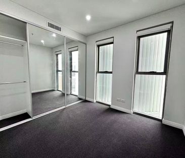 High Level Pristine Near New 2 Bedder Apartment in the heart of Granville - Photo 2