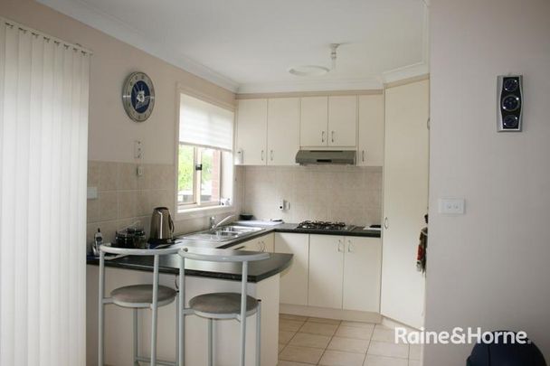 Conveniently Postioned Townhouse - Photo 1