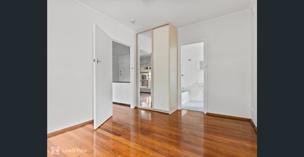Affordable Neat & Tidy Unit Located Close to the CBD - Photo 1