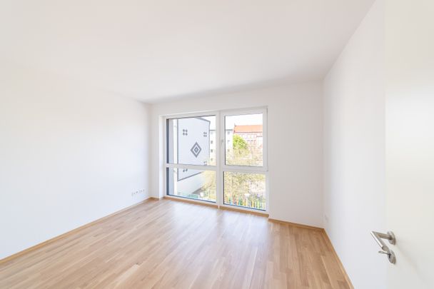 Erstbezug - 3-Raumwohnung mit Sonnenbalkon, Tiefgaragenstellplatz und EBK - WE10 - Foto 1