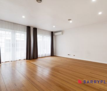 Stylish, Spacious & Conveniently Located 3-Bedroom Townhouse - Photo 1