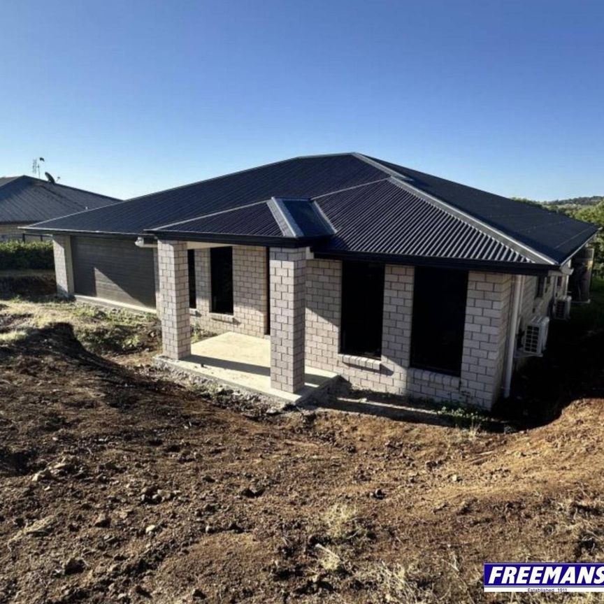 Brand New 4 Bedroom Home with Elevated Views - Hospital Hill - Photo 1