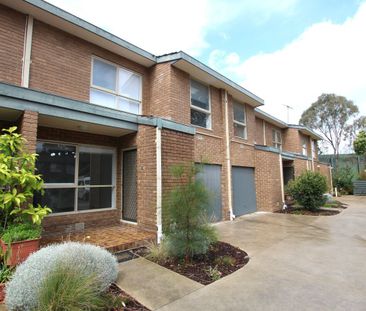 Newly Renovated 3-Bedroom Unit - Photo 2