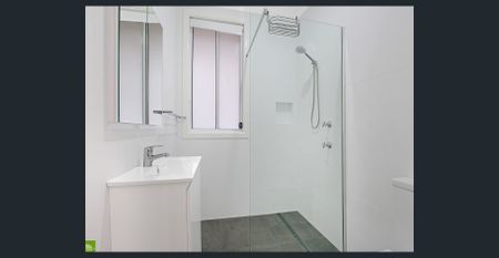 Renovated Home with Lawn Maintenance Included! - Photo 4