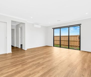 Looking to live near Wyndham Vale Square Shopping Centre? This home... - Photo 1