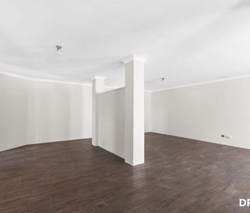 Spacious Family Living Opposite the Park! - Photo 2