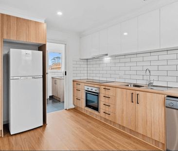 Beachside Living with Modern Comfort and Convenience - Photo 4