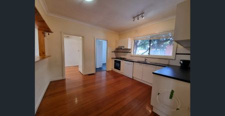 IDEALLY LOCATED HOME - Photo 3