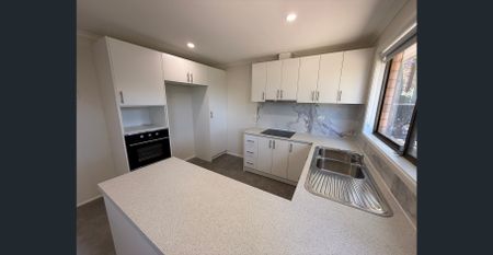 Freshly Renovated Family Home in the Heart of Ambarvale! - Photo 5