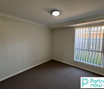 Four-Bedroom Home in Oxley Vale - Photo 6