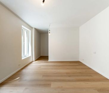 Appartement te huur - foto 1