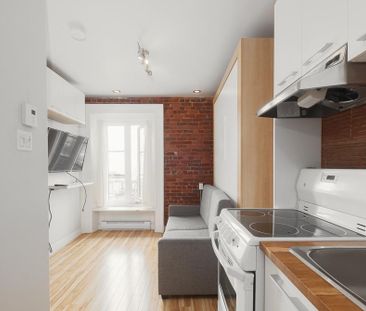 Loft entièrement meublé en plein coeur du quartier St-Jean-Baptiste... - Photo 3