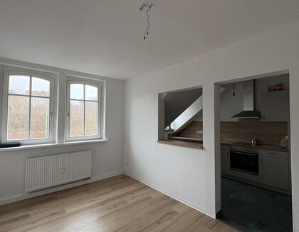 Zentral gelegene Dachgeschosswohnung mit Einbauküche in Zwickau - Photo 1