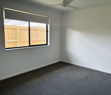 Spacious 4-Bedroom, 2-Bathroom House - Photo 3