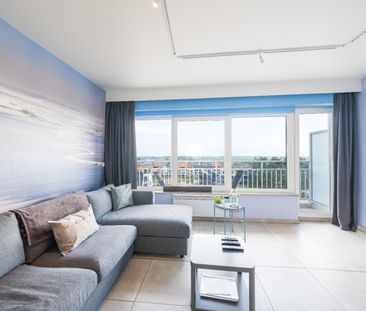 Vernieuwde studio met zongericht terras te huur - Photo 3