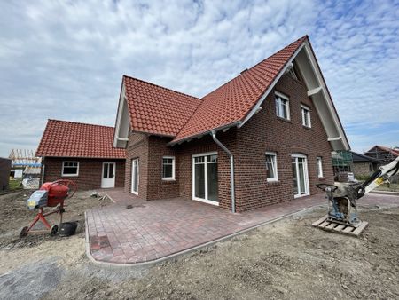 Neubauwohnung im Erdgeschoss mit großer Garage und Garten - Foto 5