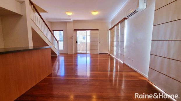 Good Size Townhouse in Great Taringa location - Photo 1
