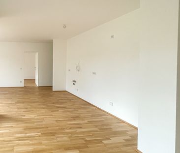 Schöne geförderte 3-Zimmer-Wohnung mit Tiefgaragenparkplatz und Log... - Photo 6