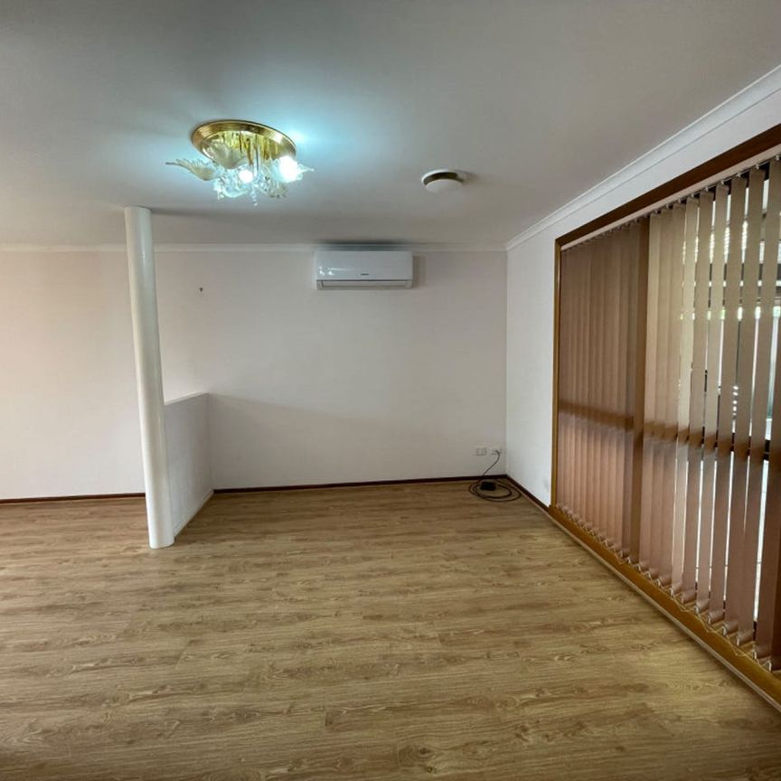 Spacious Family Home with Multiple Living Areas - Photo 1