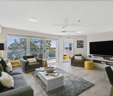 Immaculate 3-Bedroom Furnished Apartment with Private Rooftop & Riv... - Photo 1