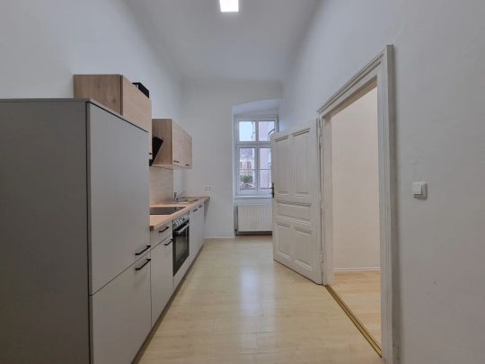 Top-Lage für Studierende und Junggebliebene – Eine Wohnlage, die urbanes Lebensgefühl mit hoher Lebensqualität vereint. - Photo 1