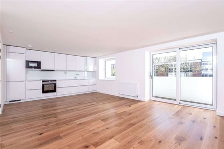 An immaculately presented two bedroom flat with a large kitchen/reception room offering flexible living space, wood flooring and access out onto the private balcony. - Photo 5