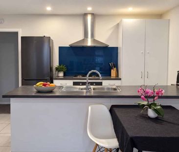 Modern, warm 4BR Home in Tuakau w/ Deck - Photo 4