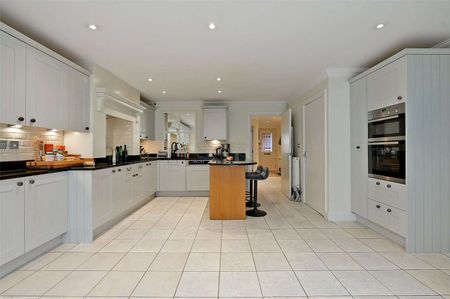 A spacious and impressive town house with ground floor rear extension in this sought after development. - Photo 4