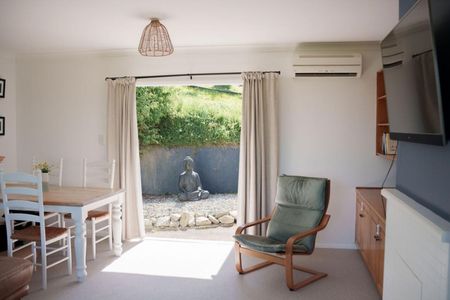 Sunny Elevated Home Near Tahunanui Beach – Privacy, Views and Character - Photo 5