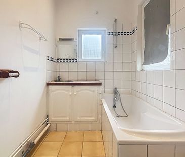 Appartement à louer - REIMS- RUE RUINART DE BRIMONT - Photo 4