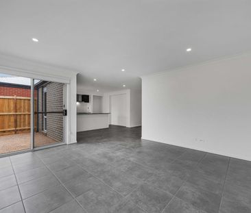 Well-Designed Four-Bedroom Home with Modern Comforts - Photo 2