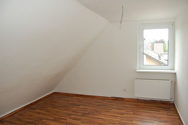 Gemütliche 2-Zimmer-Dachgeschosswohnung in zentraler Lage! - Foto 1