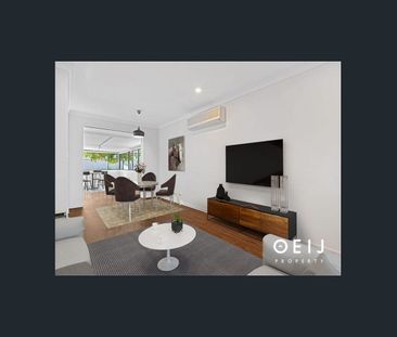 FAMILY OASIS WITH TRIPLE GARAGE & POOL! - Photo 2