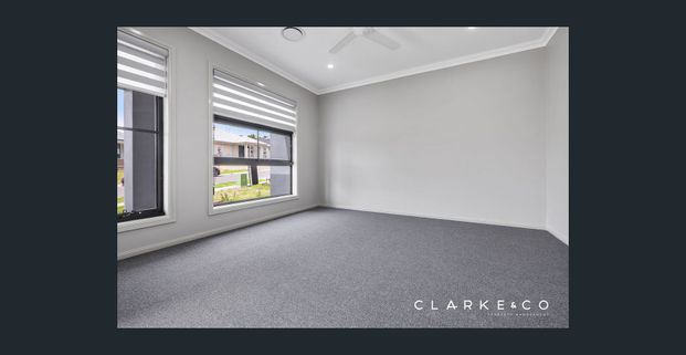 MODERN FAMILY LIVING IN PRIME NORTH ROTHBURY LOCATION! - Photo 1