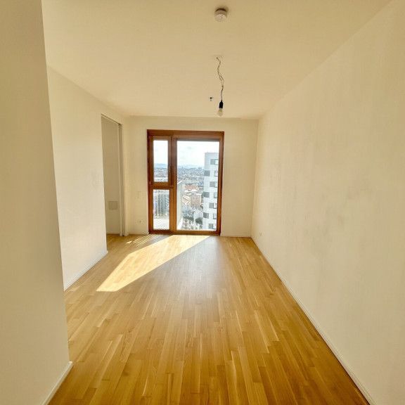 moderne 2-Zimmer Wohnung im 18.OG nächst Hauptbahnhof (Dachterrasse, Co-Working Bereich & Gym inklusive) - Foto 1