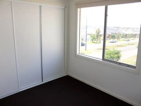 “Bright, Fresh, Stunning Townhouse with Open Plan living!” - Photo 4