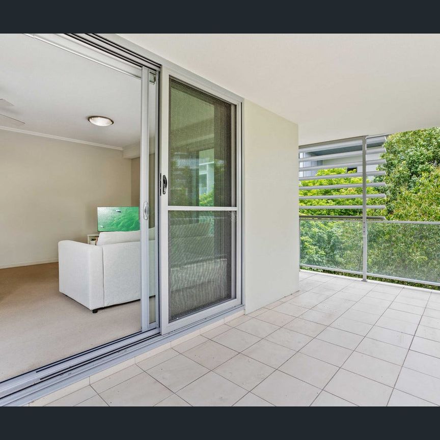 Fantastic Corner Unit – Ultimate Privacy with a Spacious Balcony! - Photo 1
